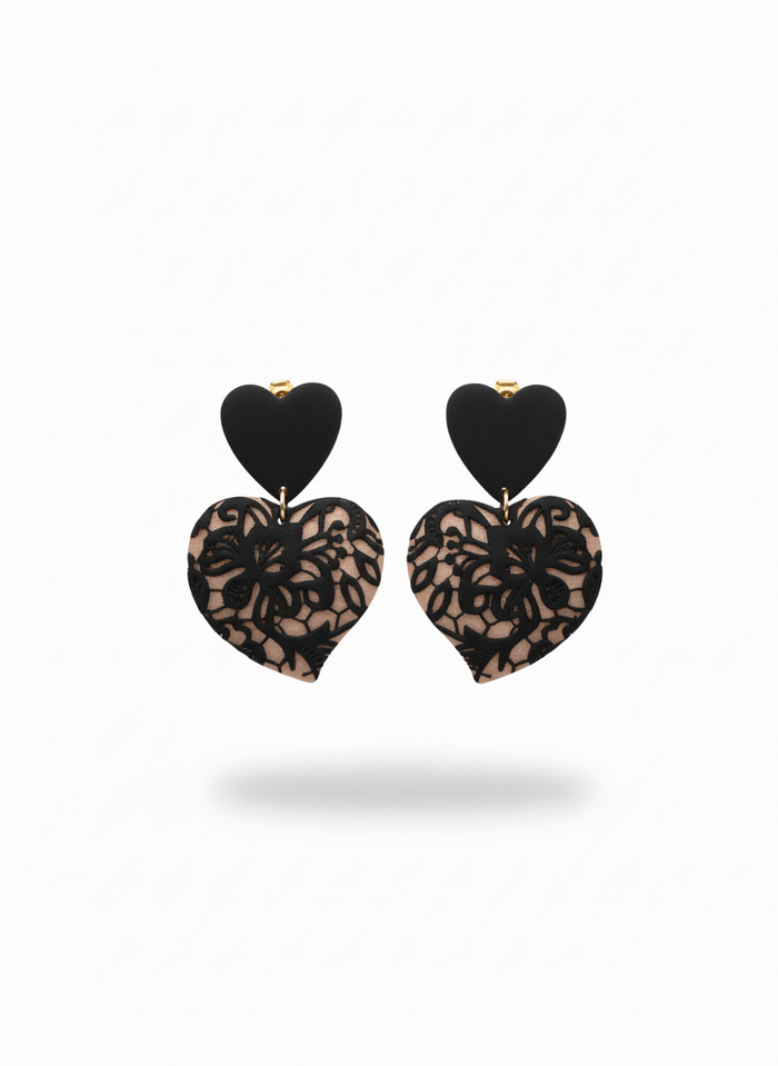 Black Lace Puffy Heart Statement Earrings handmade by Sunni Dineen, on a white background.