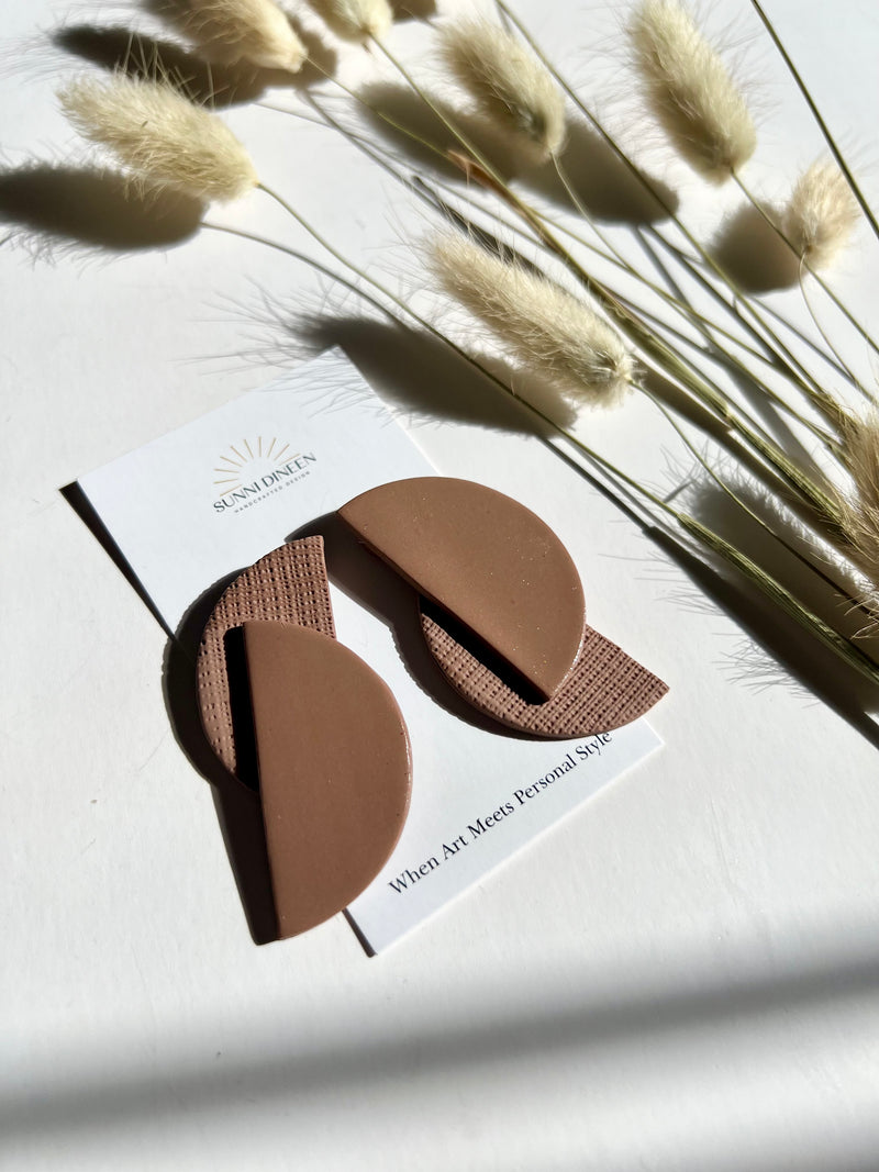 Elodi geometric statement earrings in mocha mousse on product card with Sunni Dineen Handcrafted Design logo — handcrafted jewelry for women.