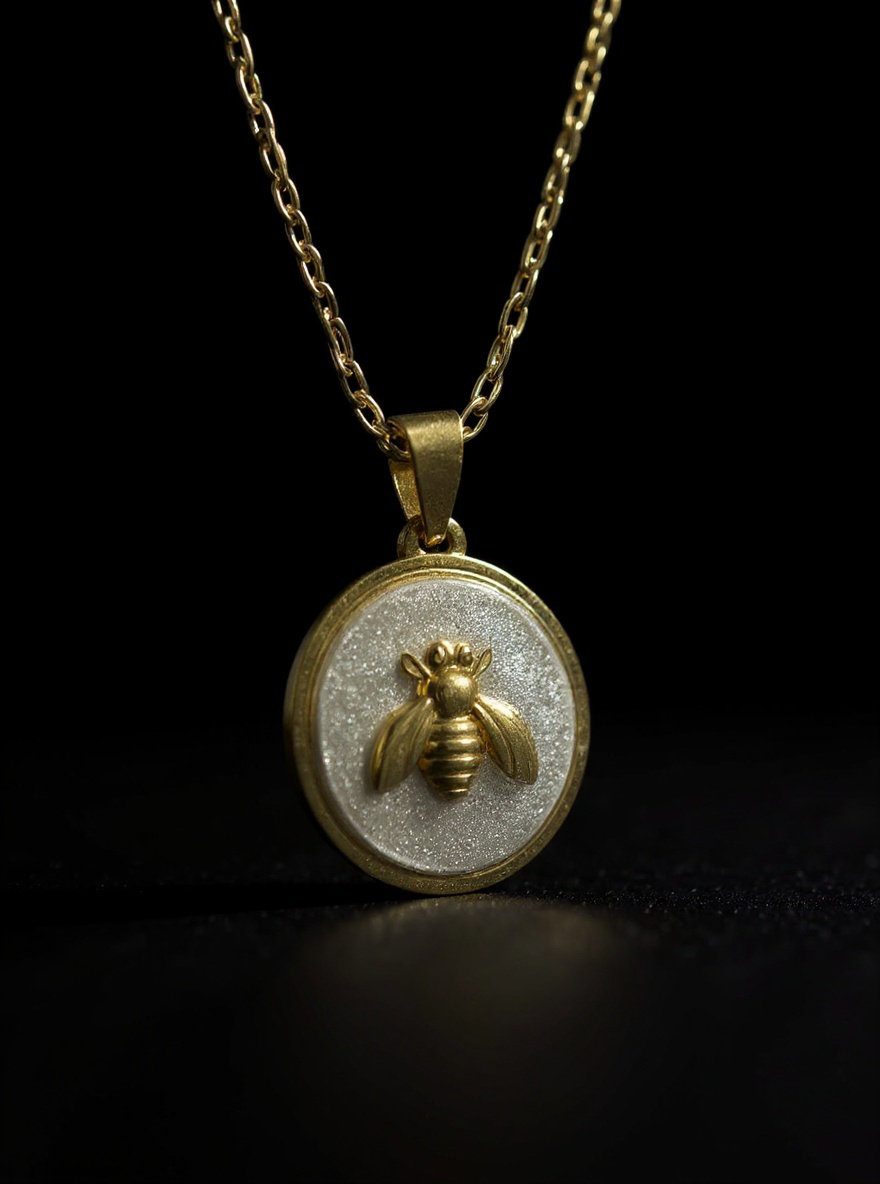 Queen Bee Pendant Necklace in gold from Sunni Dineen Handcrafted Design, handcrafted jewelry symbolizing her quiet power, purpose and presence.