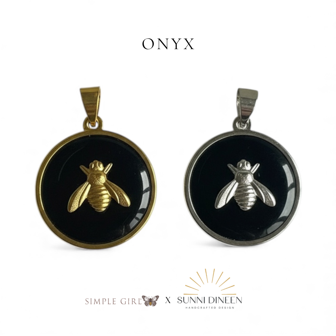 Queen Honeybee Necklace Pendants, one gold and one silver displayed on a white background with 'ONYX' text color option above by Simple Girl Brand X Sunni Dineen Handcrafted Design.