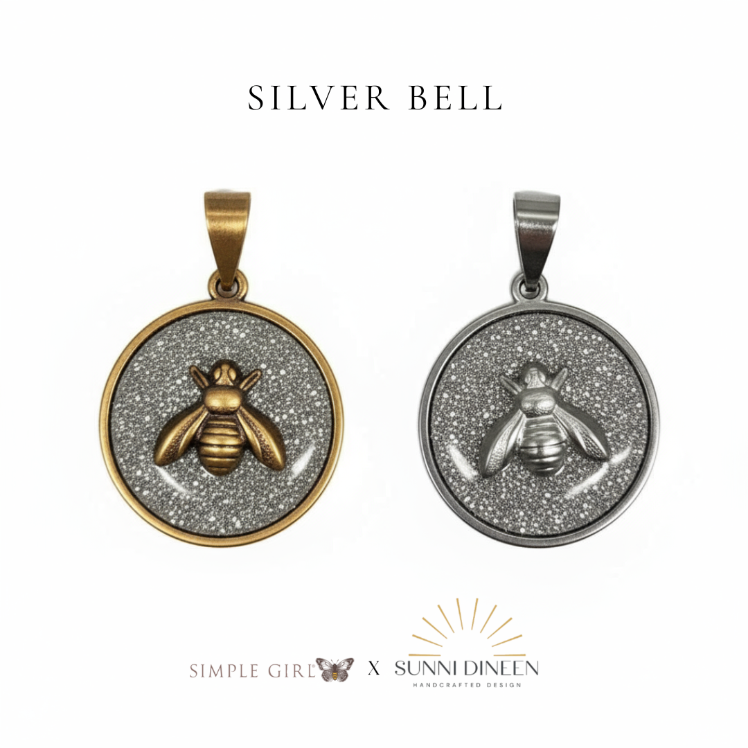 Queen Honeybee Necklace Pendants, one gold and one silver displayed on a white background with 'SILVER BELL' text color option above by Simple Girl Brand X Sunni Dineen Handcrafted Design.