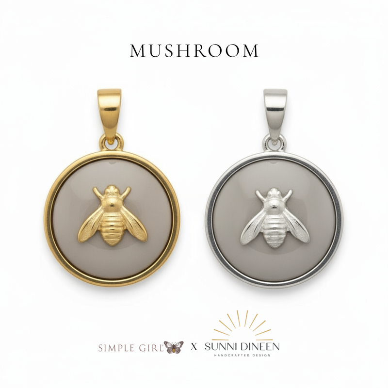 Queen Honeybee Necklace Pendants, one gold and one silver displayed on a white background with 'MUSHROOM' text color option above by Simple Girl Brand X Sunni Dineen Handcrafted Design.