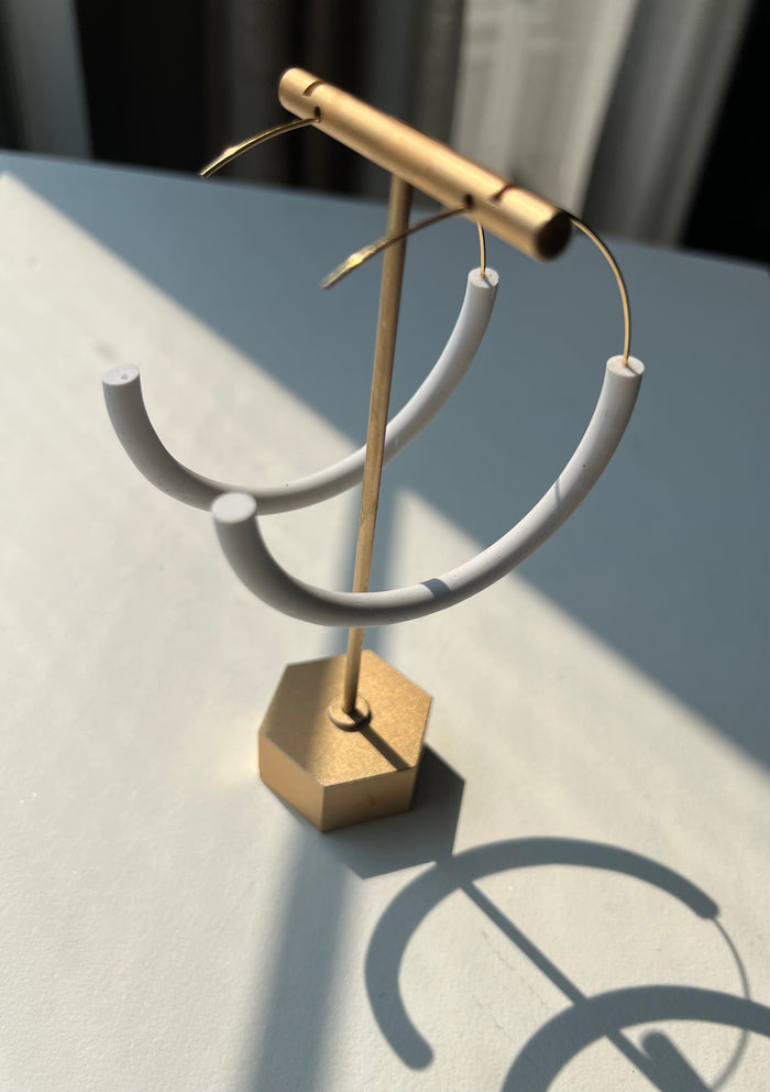 14k gold-filled handmade weightless infinity hoop earrings from Sunni Dineen Handcrafted Design created for women who redefine luxury with intention and style.