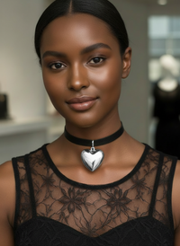 Woman wearing The Heart of Gold Choker Necklace by Sunni Dineen, in black-silver wearing a black lace blouse.