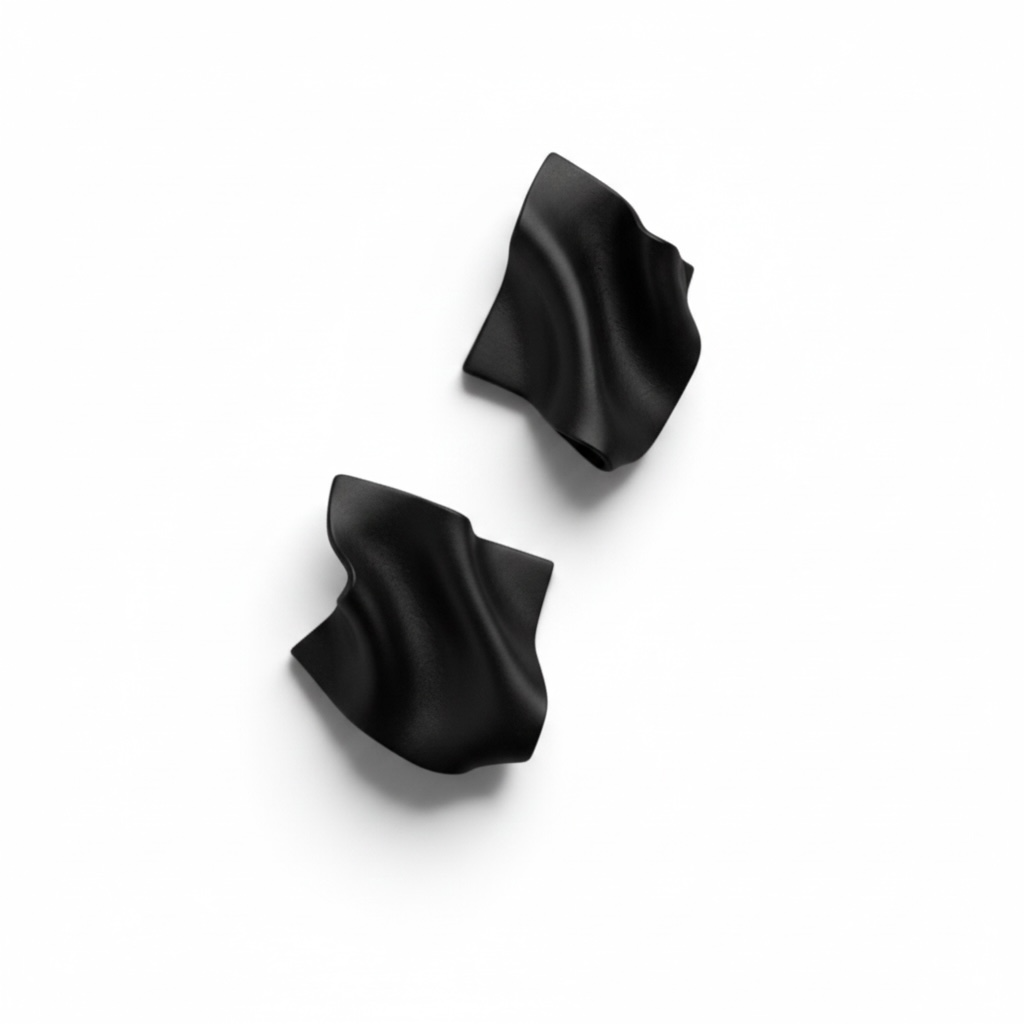 A pair of black Monae sculptural statement earrings