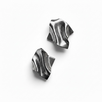 A pair of silver leaf Monae sculptural statement earrings