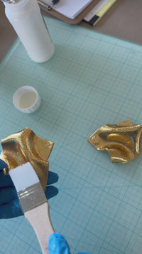 Behind the scenes footage of the making of the gold 'Monae' statement earrings handmade by Sunni Dineen.