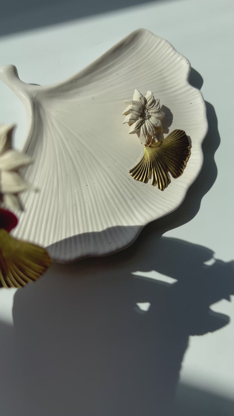 Pair of 'Yasmine Statement Earrings' placed  on the 'Ginkgo Leaf Trinket Dish', handmade by Sunni Dineen.