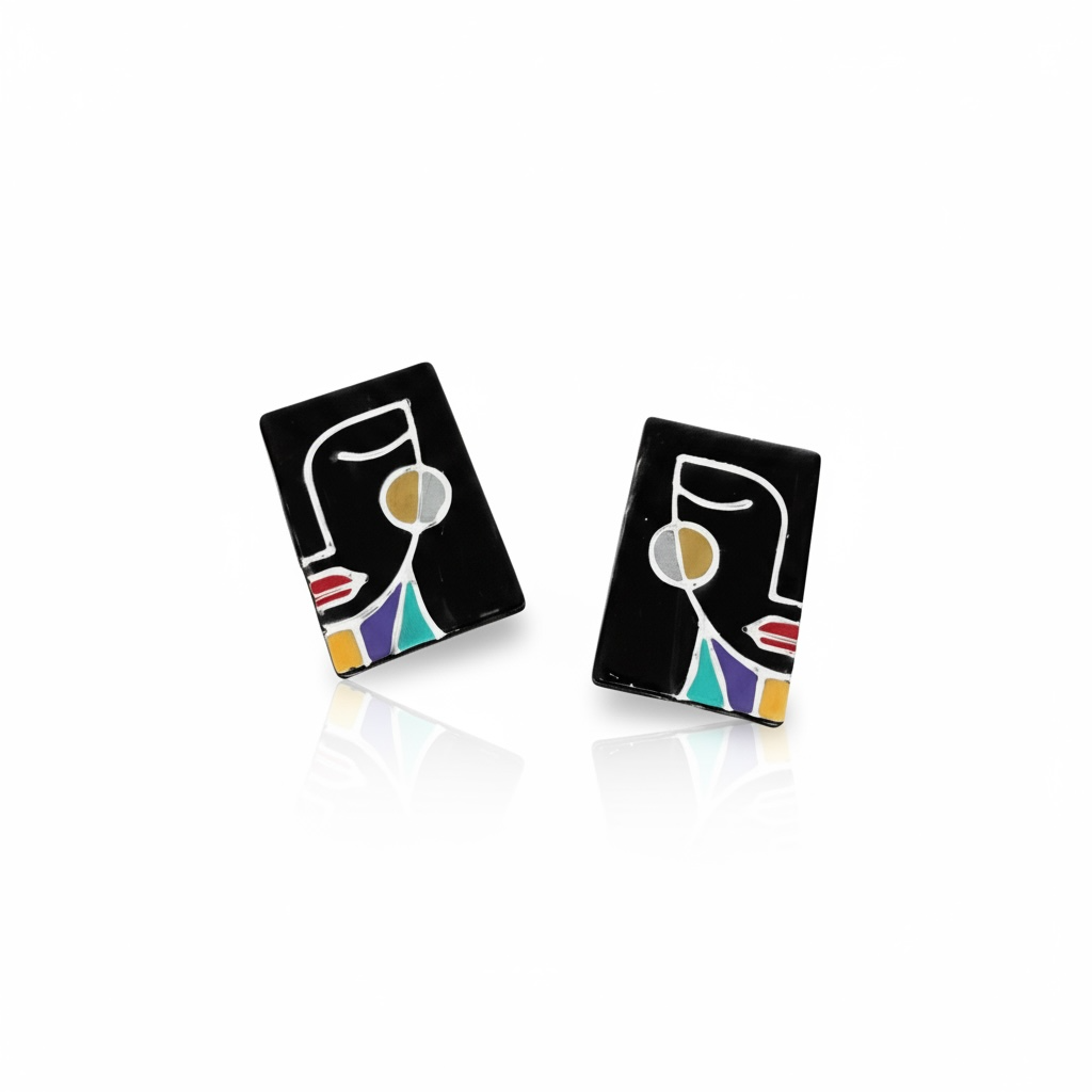 Black Simone abstract face statement stud earrings handmade from polymer clay.