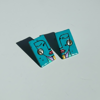 Turquoise-granite 'Simone' abstract face statement stud earrings handmade from polymer clay.