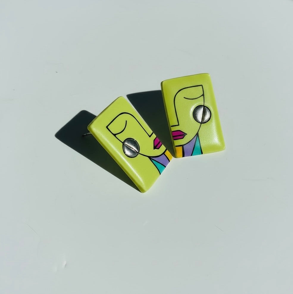 Wasabi-colored 'Simone' abstract face statement stud earrings handmade from polymer clay.