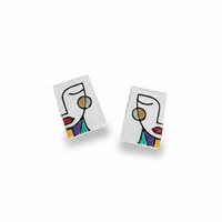 White Simone abstract face statement stud earrings handmade from polymer clay.