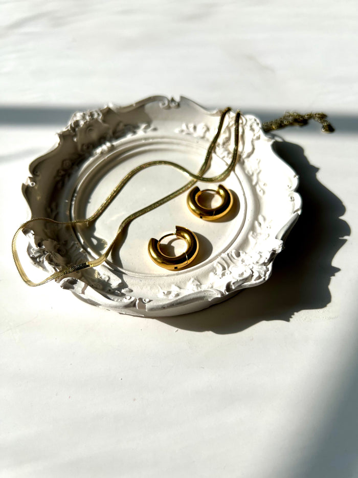 Ivory vintage trinket dish styled with gold hoops and chain necklace — handmade decorative jewelry dish by Sunni Dineen